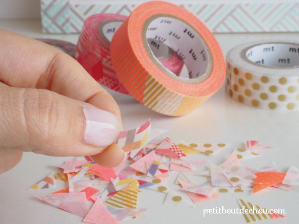 Masking tape triangles on backing paper